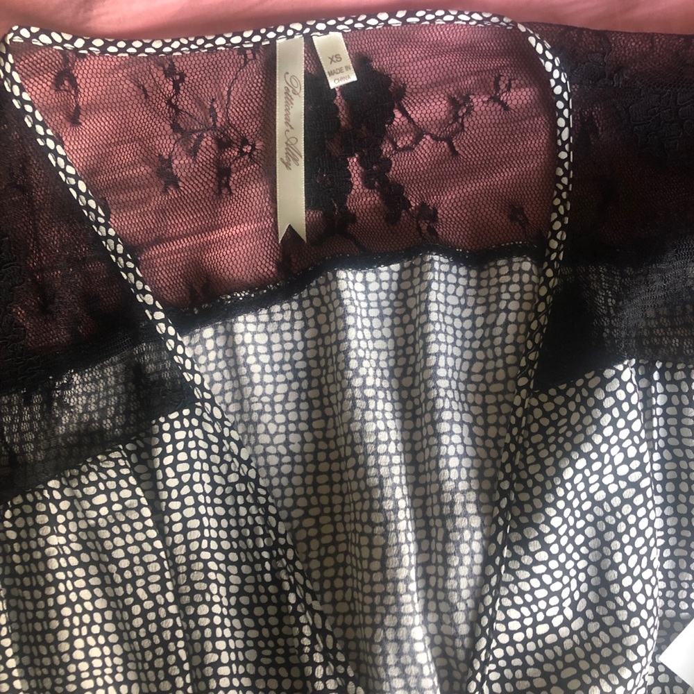 Black and White dress with lace shoulders.